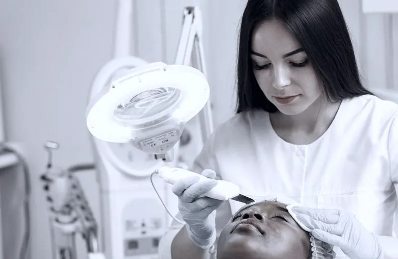 A clinician performing a treatment in a med spa