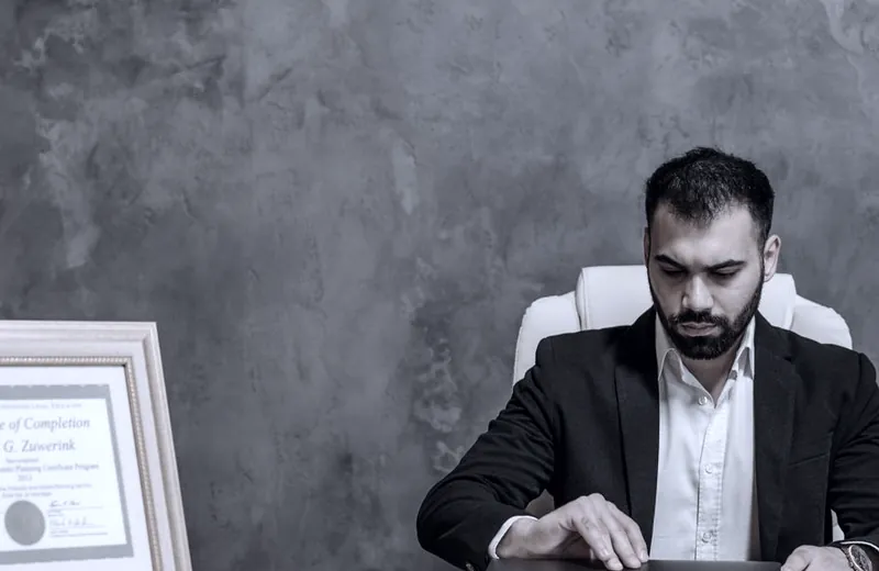 An attorney working at a desk in an office